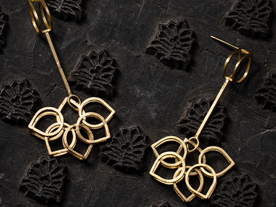 gold floral shaped earrings