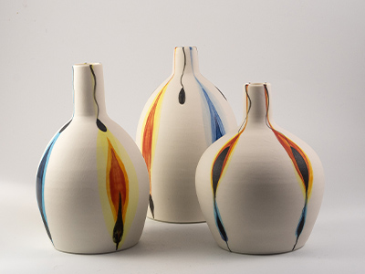 White vases with colourful patterns