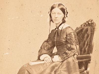 A photograph of Florence Nightingale seated and looking at camera