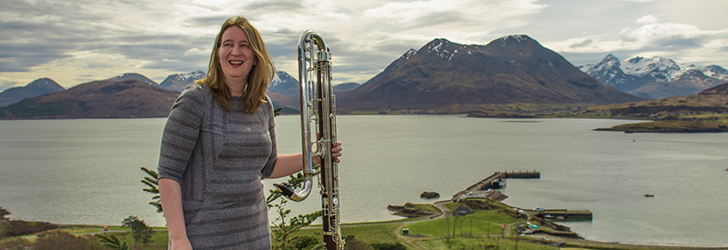 Sarah Watts outside with mountain background