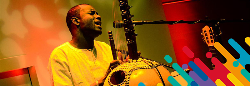 Photograph of Sura Susso playing Kora