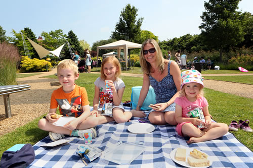 Family enjoying a picnic in University Park