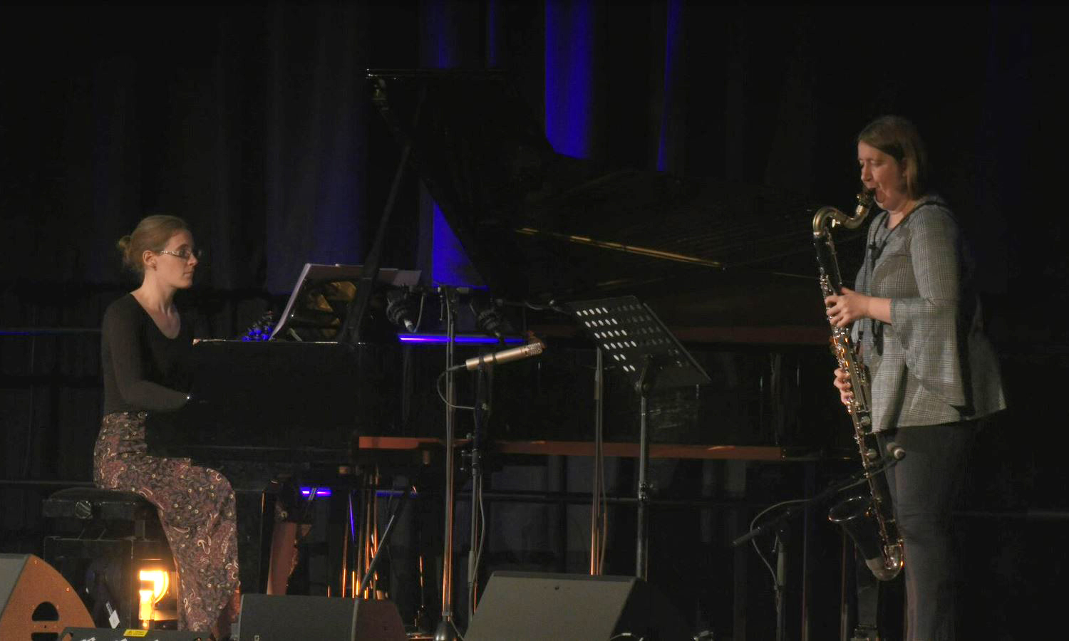 Anne MacGregor and Sarah Watts performing together on a stage