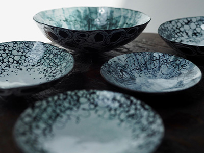 Metal bowls with blue patterned insides