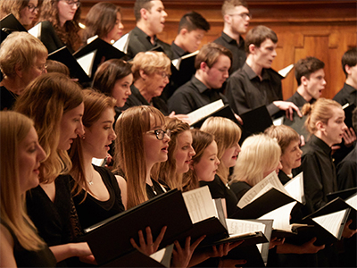 Group of people singing in a choir 