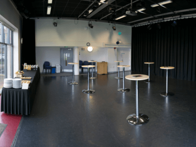 Performing Arts Studio with standing tables and catering